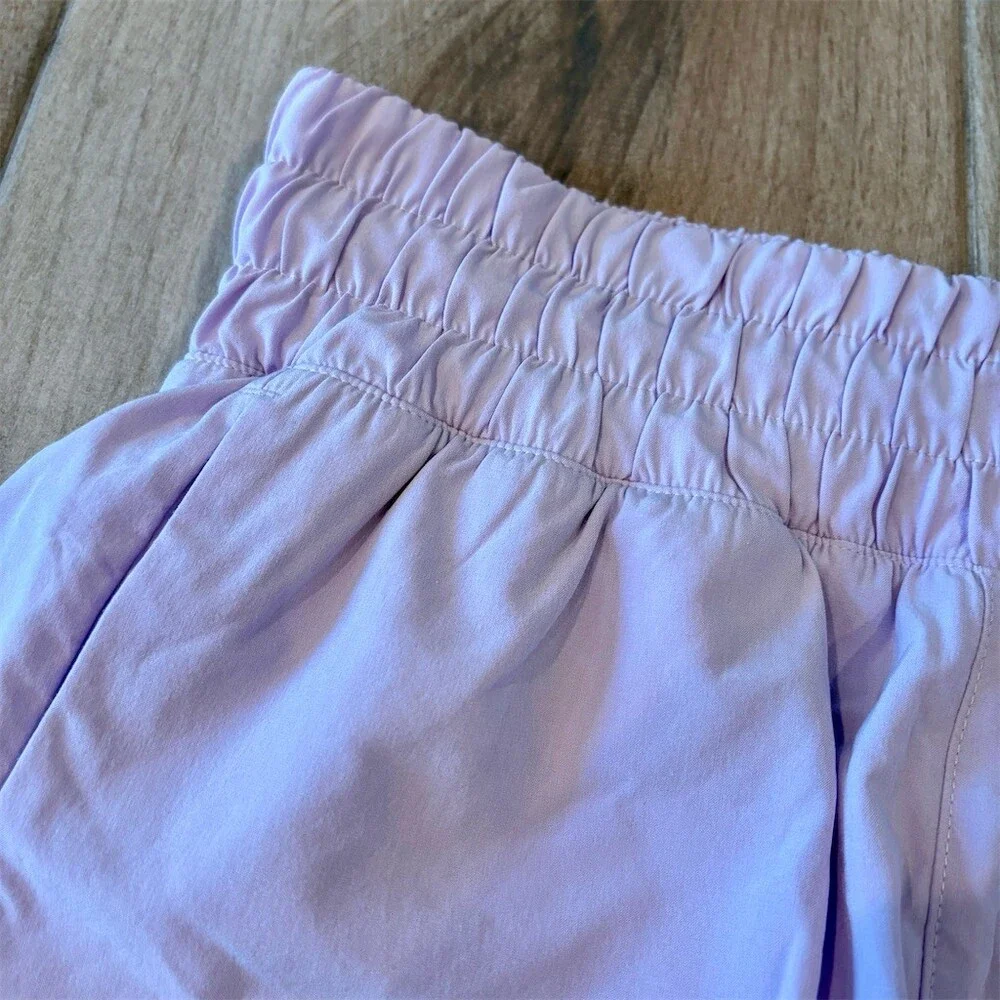 Athleta Girl Run Free Running Shorts Girls L 12 Lavender Purple Blue Trim